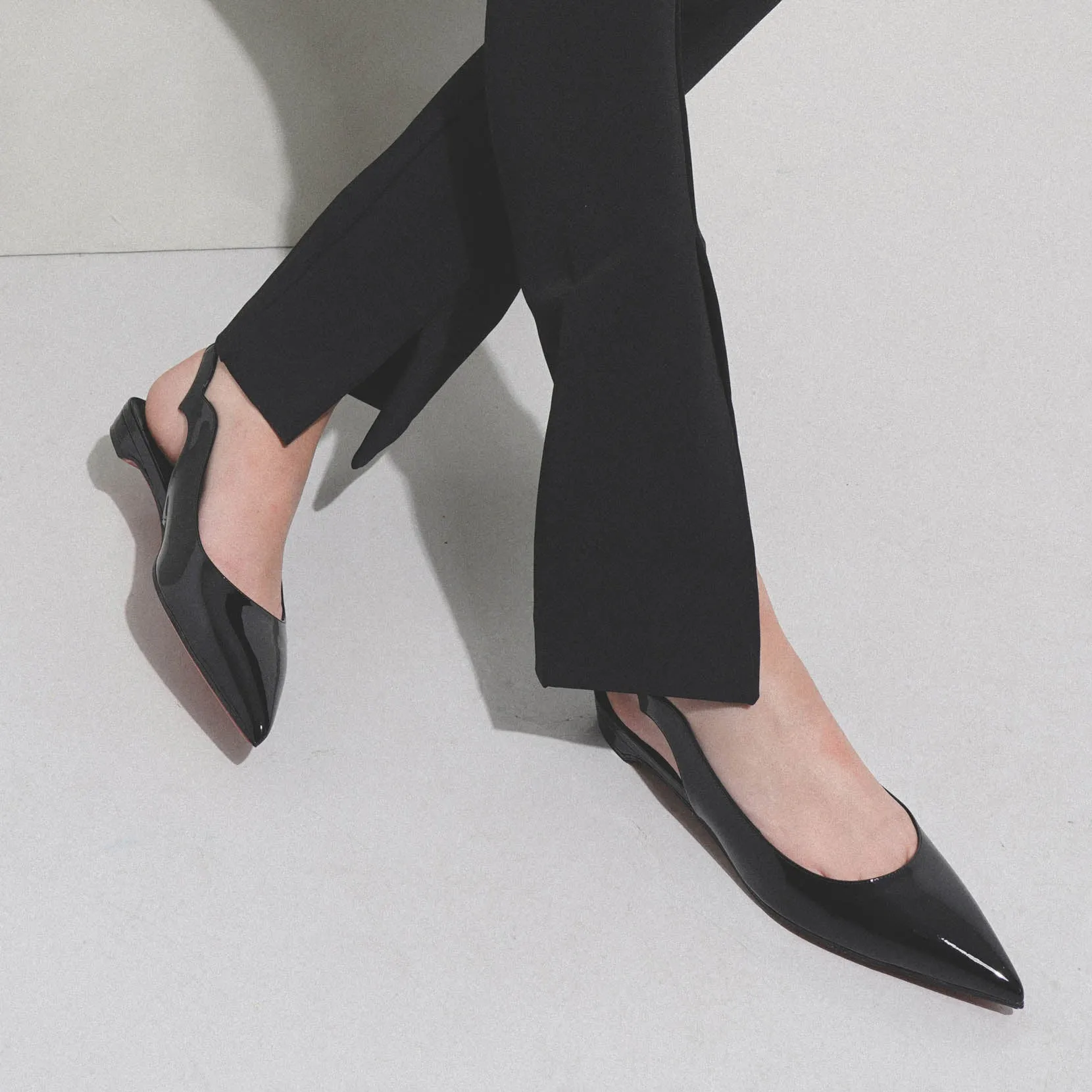 Hot Chickita sling black patent flats